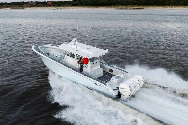  Yacht Photos Pics 2018 Yellowfin 39 Offshore boat cruising on open water with powerful engines.