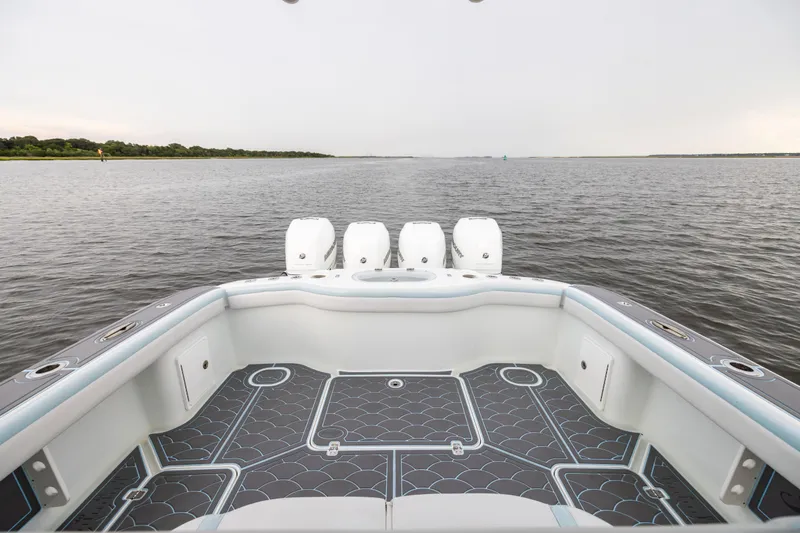  Yacht Photos Pics 2018 Yellowfin 39 Offshore boat with quad engines on calm water.