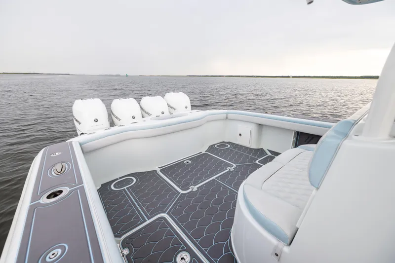  Yacht Photos Pics 2018 Yellowfin 39 Offshore boat with spacious deck and multiple outboard engines.