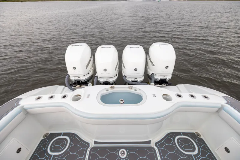  Yacht Photos Pics 2018 Yellowfin 39 Offshore boat with four Mercury outboard engines on water.