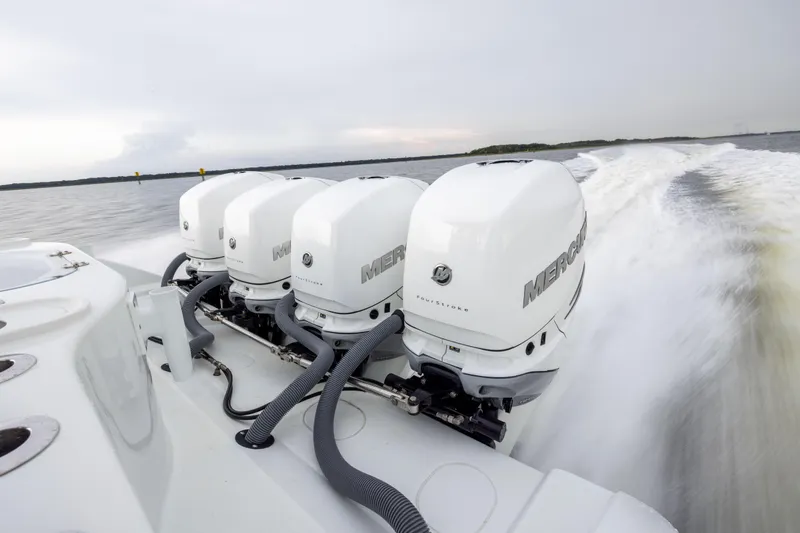 Yacht Photos Pics 2018 Yellowfin 39 Offshore boat with four powerful Mercury outboard engines on open water.