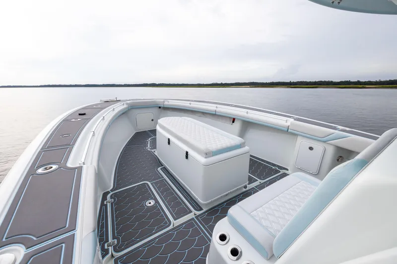  Yacht Photos Pics 2018 Yellowfin 39 Offshore boat interior with cushioned seating and scenic water view.