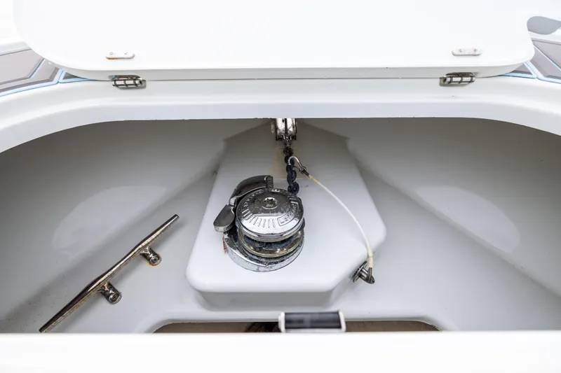  Yacht Photos Pics Anchor compartment of 2018 Yellowfin 39 Offshore boat, featuring a winch and cleat.