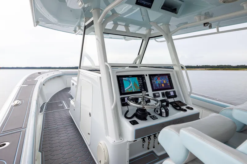  Yacht Photos Pics 2018 Yellowfin 39 Offshore boat cockpit with advanced navigation systems and sleek design.