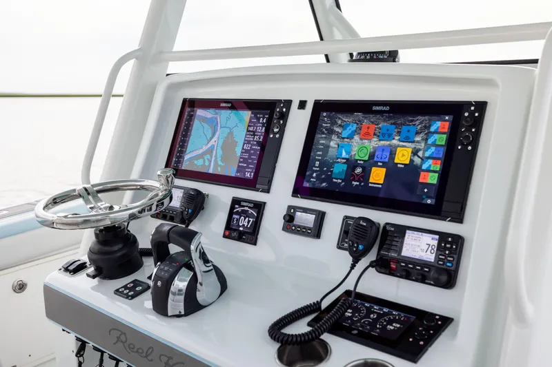  Yacht Photos Pics 2018 Yellowfin 39 Offshore boat dashboard with advanced navigation and control systems.