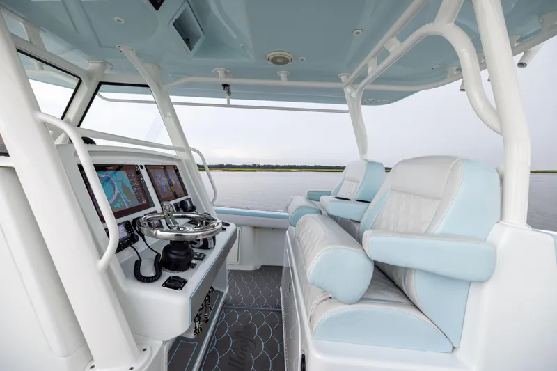  Yacht Photos Pics 2018 Yellowfin 39 Offshore boat interior with modern helm and seating.