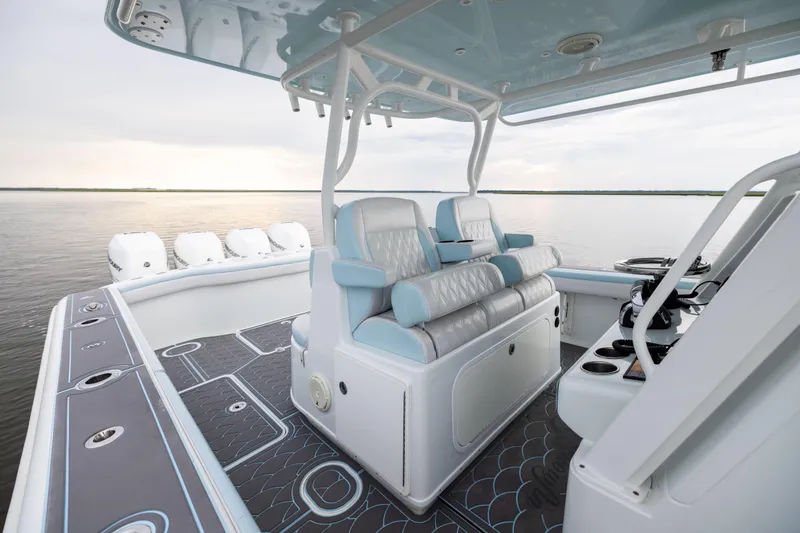  Yacht Photos Pics 2018 Yellowfin 39 Offshore boat interior with luxurious seating and modern design on calm water.