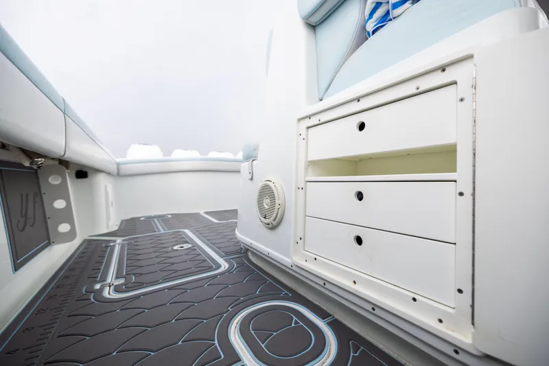  Yacht Photos Pics 2018 Yellowfin 39 Offshore boat interior with storage drawers and patterned flooring.