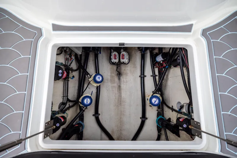  Yacht Photos Pics 2018 Yellowfin 39 Offshore boat compartment with visible wiring and equipment.