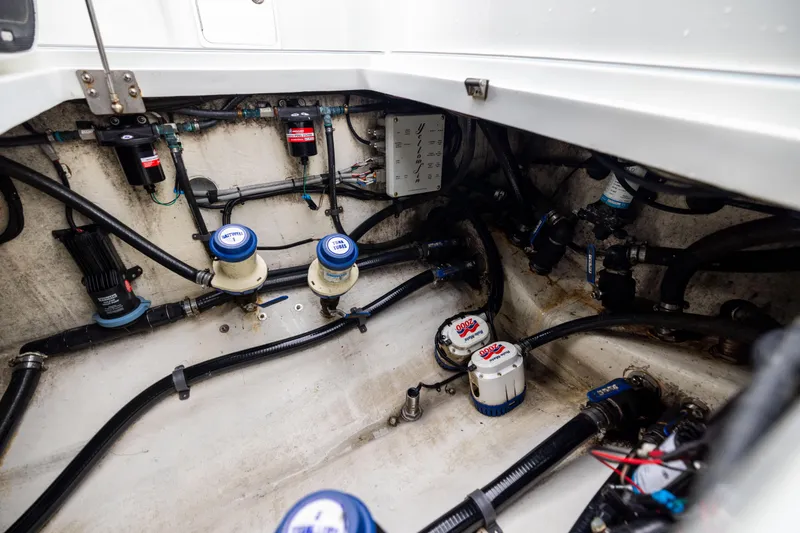  Yacht Photos Pics Engine compartment of a 2018 Yellowfin 39 Offshore boat, showcasing mechanical components.