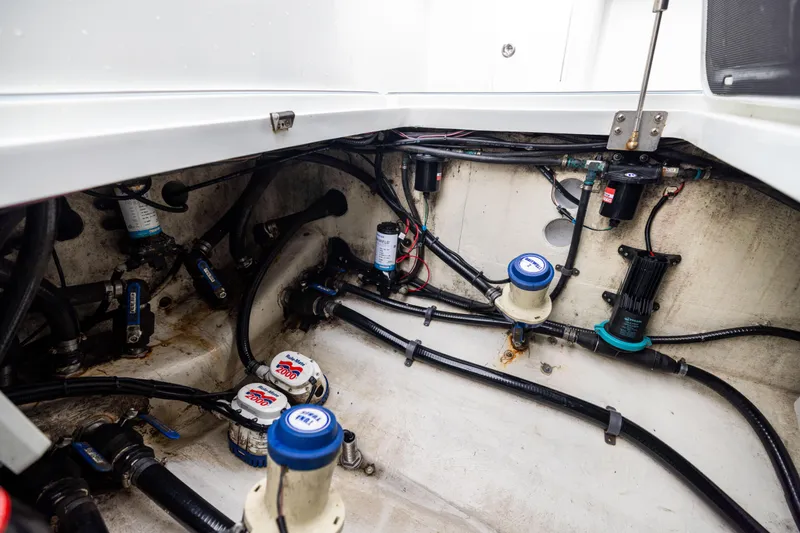  Yacht Photos Pics Engine compartment of 2018 Yellowfin 39 Offshore boat, showcasing wiring and components.