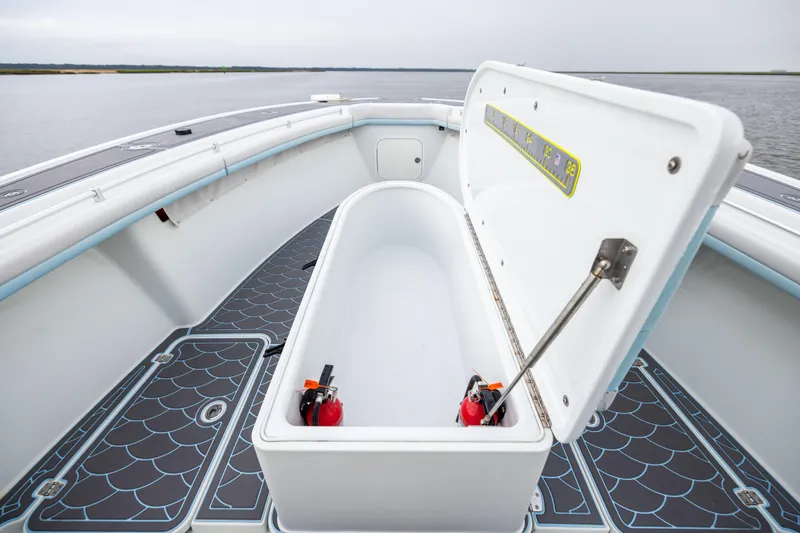  Yacht Photos Pics 2018 Yellowfin 39 Offshore boat with open storage compartment on deck.