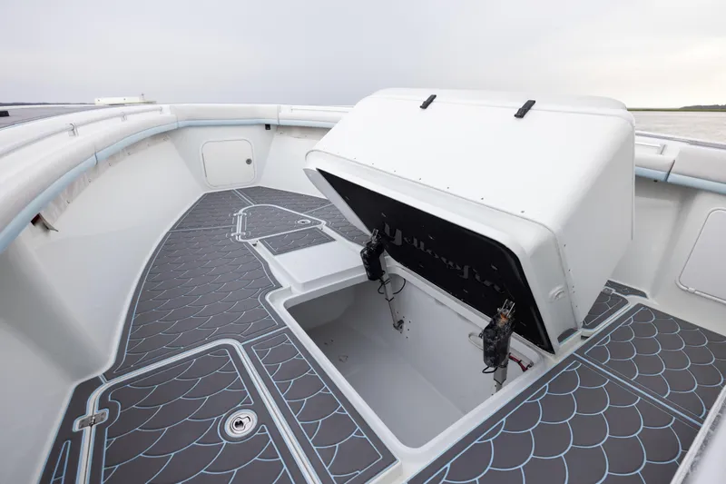  Yacht Photos Pics 2018 Yellowfin 39 Offshore boat deck with open storage compartment.