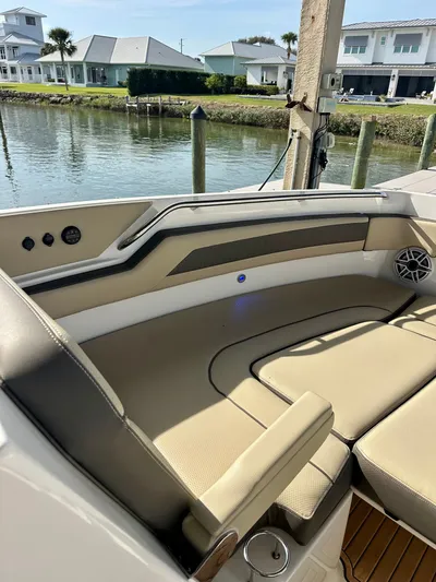 Breeezy Yacht Photos Pics Interior of a 2020 Pursuit DC 365 Dual Console boat by the water.