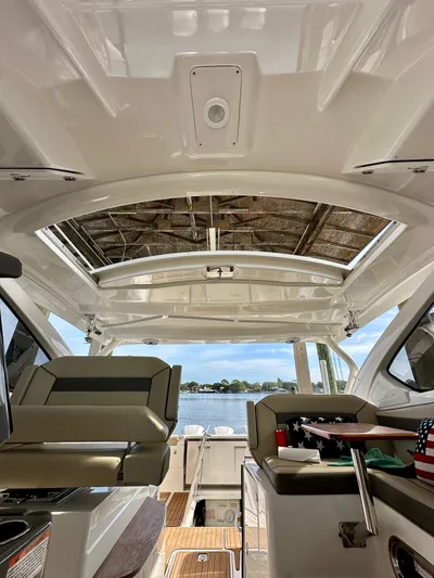 Breeezy Yacht Photos Pics Interior view of a 2020 Pursuit DC 365 Dual Console boat.