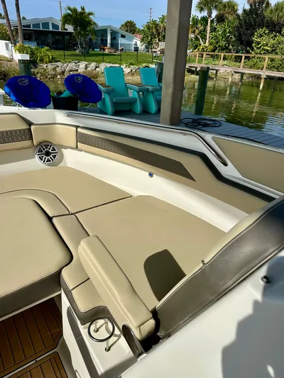 Breeezy Yacht Photos Pics Interior of a 2020 Pursuit DC 365 Dual Console by the water.
