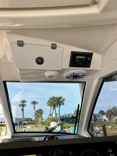 Breeezy Yacht Photos Pics 2020 Pursuit DC 365 Dual Console interior view with electronics.