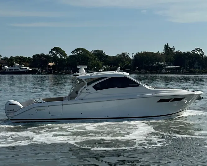 Breeezy Yacht Photos Pics 2020 Pursuit DC 365 Dual Console on calm water.
