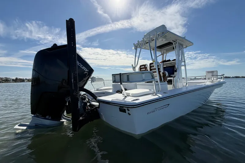  Yacht Photos Pics 2024 East Cape 25 Hybrid boat on calm water under a clear sky.