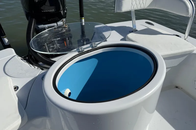  Yacht Photos Pics 2024 East Cape 25 Hybrid boat with open livewell and seating.