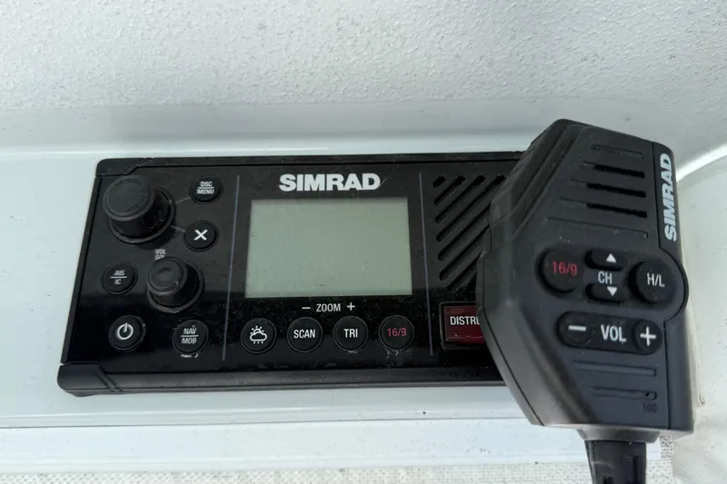  Yacht Photos Pics Simrad marine radio system on 2024 East Cape 25 Hybrid boat dashboard.