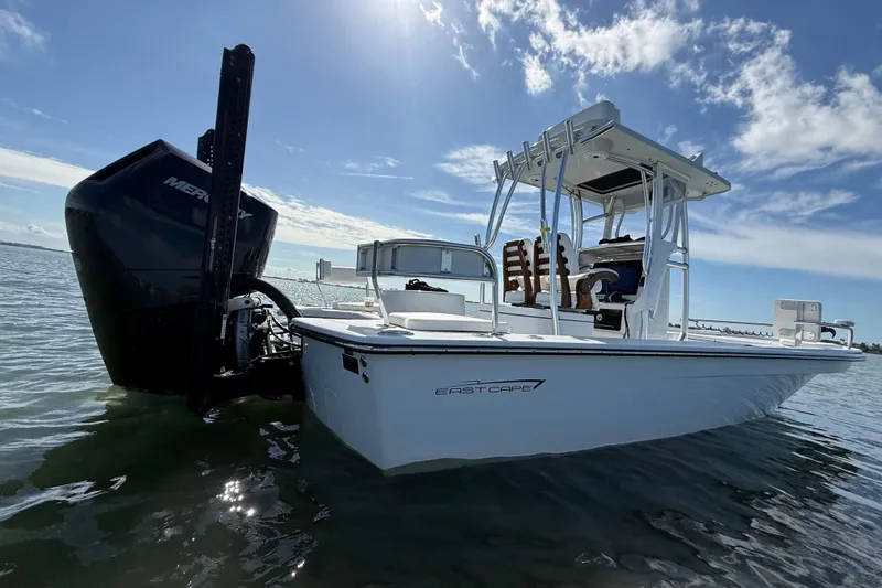  Yacht Photos Pics 2024 East Cape 25 Hybrid boat on water, featuring sleek design and powerful engine.