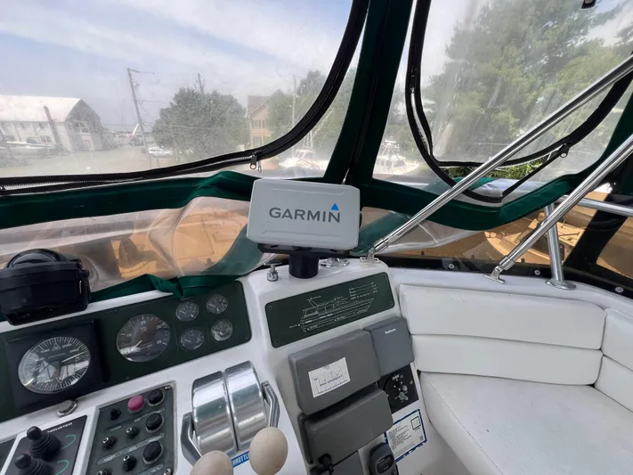 Amities Yacht Photos Pics Cockpit of 1998 Mainship 47 Motor Yacht with Garmin navigation system.