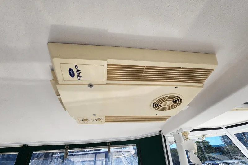 Sea Change Yacht Photos Pics Ceiling-mounted air conditioning unit on 2003 Endeavour 36 TrawlerCat boat.