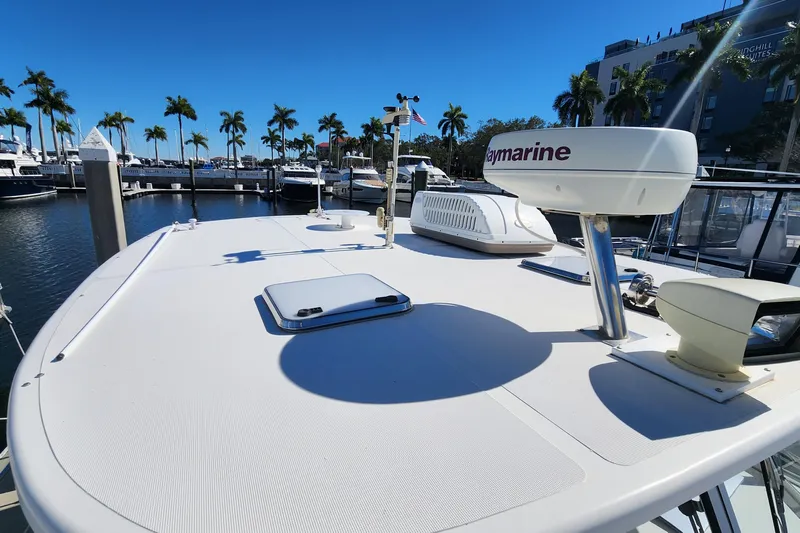 Sea Change Yacht Photos Pics 2003 Endeavour 36 TrawlerCat docked, featuring Raymarine equipment under clear blue skies.