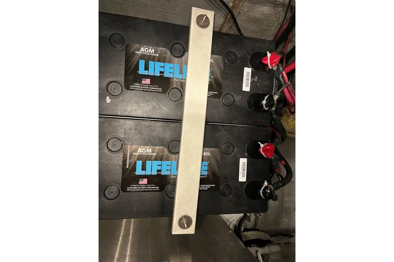 Sea Change Yacht Photos Pics AGM deep cycle batteries in a 2003 Endeavour 36 TrawlerCat engine room.