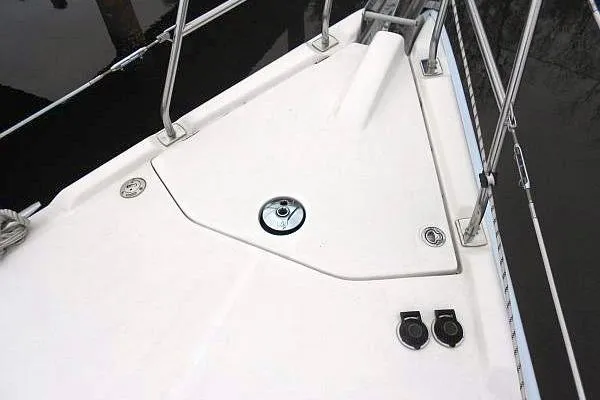 Windependence Yacht Photos Pics Deck of 2006 Hunter 38 sailboat with stainless steel fittings and clean white surface.