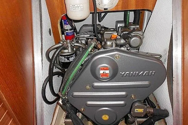 Windependence Yacht Photos Pics Yanmar engine in a 2006 Hunter 38 sailboat, showcasing detailed components and layout.