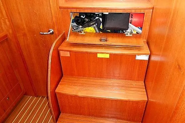Windependence Yacht Photos Pics Wooden interior steps with storage on a 2006 Hunter 38 sailboat.