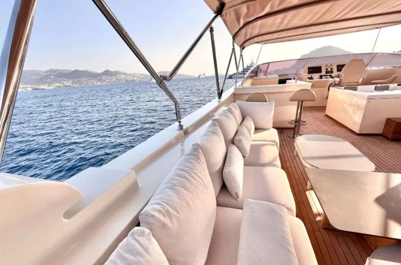  Yacht Photos Pics Luxurious 2007 Riva 115 Athena yacht deck with plush seating and ocean view.