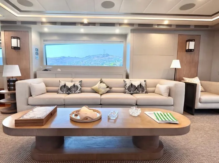  Yacht Photos Pics Luxurious interior of 2007 Riva 115 Athena yacht with elegant seating and decor.