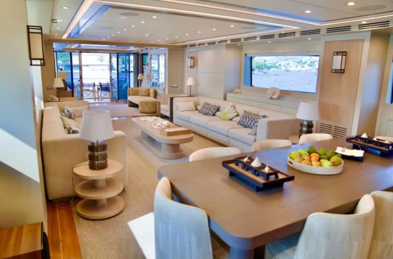  Yacht Photos Pics Luxurious interior of 2007 Riva 115 Athena yacht with elegant furnishings and spacious layout.