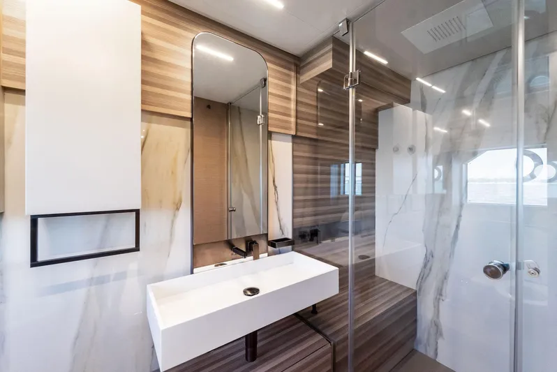 Giulia Yacht Photos Pics Luxurious bathroom in 2023 Ferretti Yachts 670, featuring modern design and elegant fixtures.