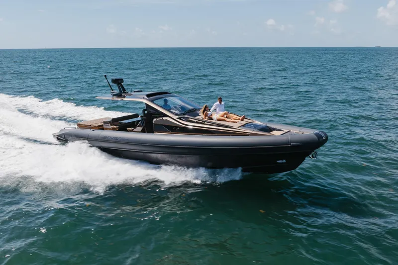 Anvera 48 Yacht Photos Pics 2025 Anvera 48 luxury yacht cruising on open sea with passengers relaxing.