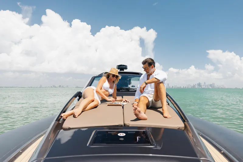Anvera 48 Yacht Photos Pics Couple relaxing on Anvera 48 yacht, 2025 model, in sunny ocean setting.