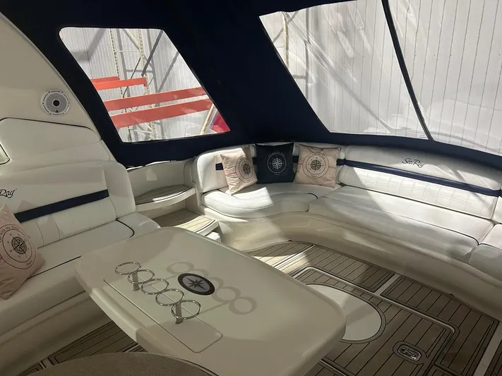 Yacht Photos Pics Luxurious interior of a 2005 Sea Ray Sundancer 520 yacht with elegant seating and nautical decor.