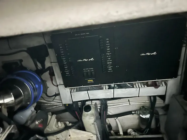  Yacht Photos Pics Engine room of 2005 Sea Ray Sundancer 520, featuring control panel and mechanical components.