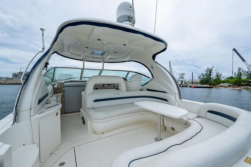 Grand Admiral Yacht Photos Pics 2004 Sea Ray 420 Sundancer yacht with spacious seating and table on deck.