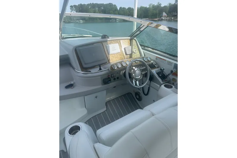  Yacht Photos Pics Cockpit of 2008 Formula 400 Super Sport boat with steering wheel and navigation controls.