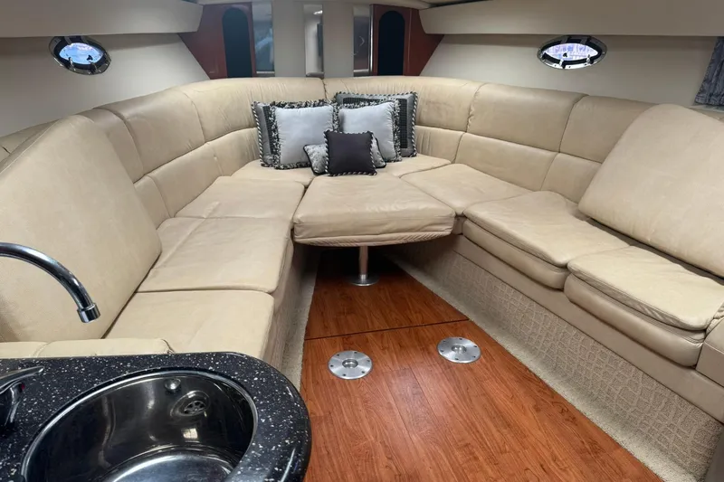  Yacht Photos Pics Luxurious interior of a 2008 Formula 400 Super Sport yacht with beige seating and wood flooring.