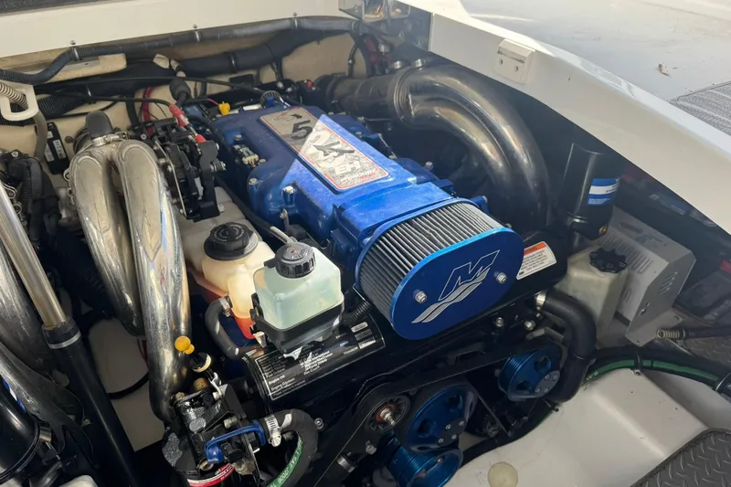  Yacht Photos Pics Engine compartment of a 2008 Formula 400 Super Sport boat, featuring a blue engine.