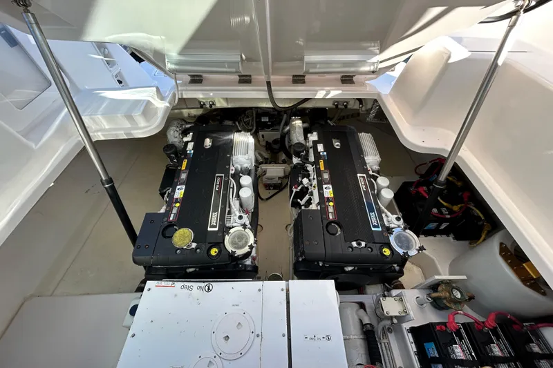  Yacht Photos Pics Engine room of 2008 Tiara Yachts 3900 Sovran, showcasing dual engines and mechanical components.