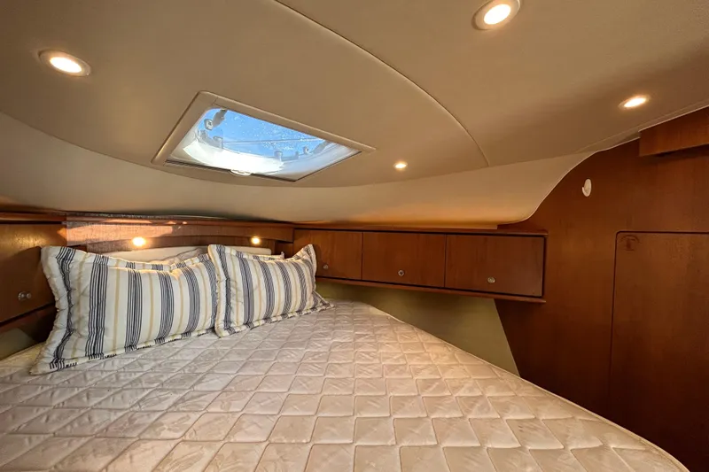 Yacht Photos Pics Luxurious cabin interior of 2008 Tiara Yachts 3900 Sovran with cozy bedding.