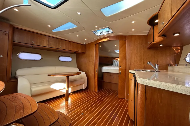  Yacht Photos Pics Luxurious interior of 2008 Tiara Yachts 3900 Sovran with wood finish and modern amenities.