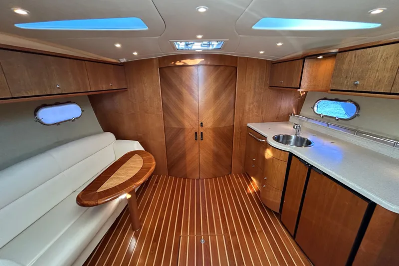  Yacht Photos Pics Luxurious 2008 Tiara Yachts 3900 Sovran interior with elegant wood finishes and modern amenities.