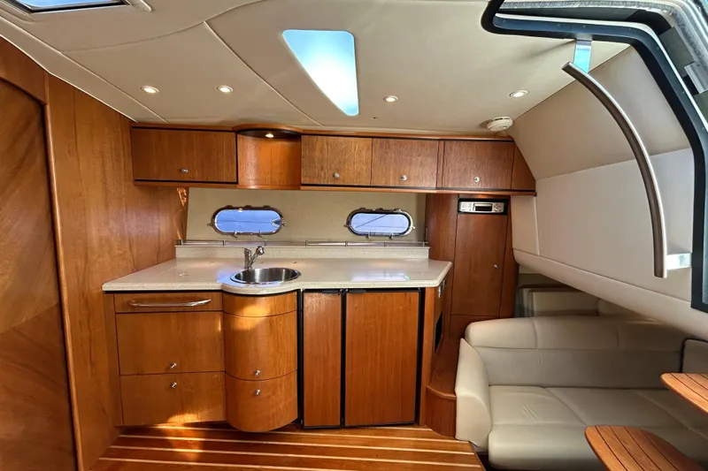  Yacht Photos Pics Luxurious 2008 Tiara Yachts 3900 Sovran interior with elegant wood cabinetry and modern amenities.